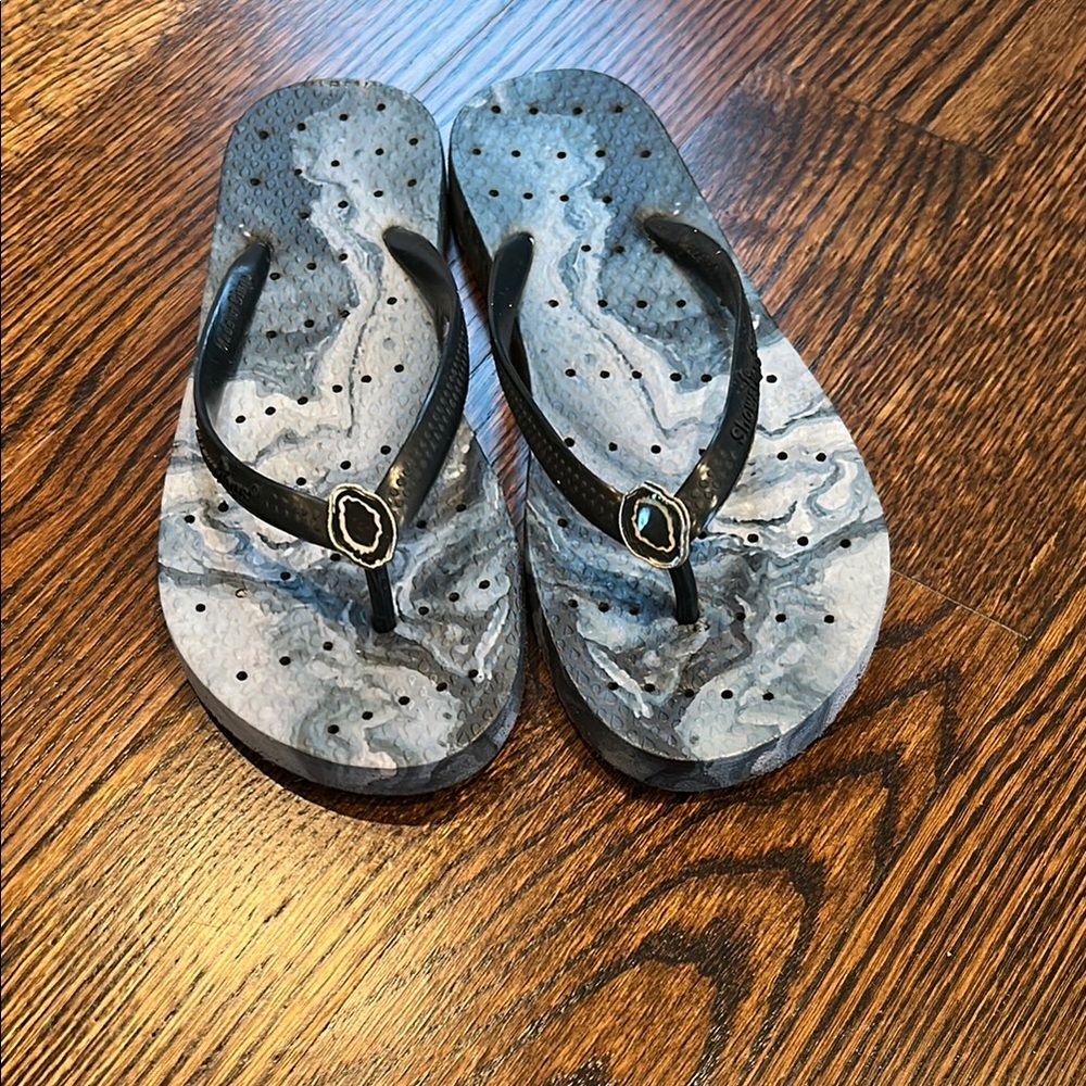 Black and Gray Flip Flops with Gemstone Accent